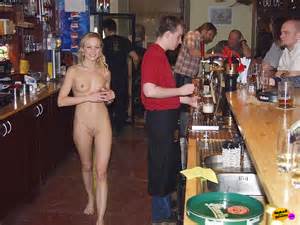 Hot bargirl walks around naked at her work - NakedOnTheStreets.com