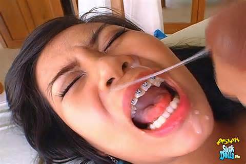 Asian Slut Gets A Load Of White Jizz On Her Face
