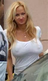 milf with big tits going braless and big hard nipples. do you think ...